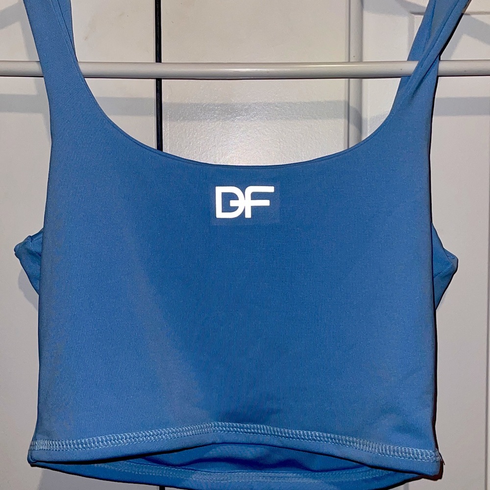 light blue colombian sports top